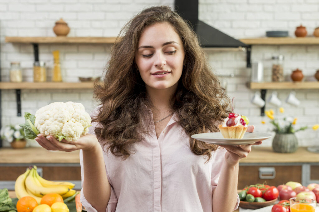 brunette woman with cabbage muffin
