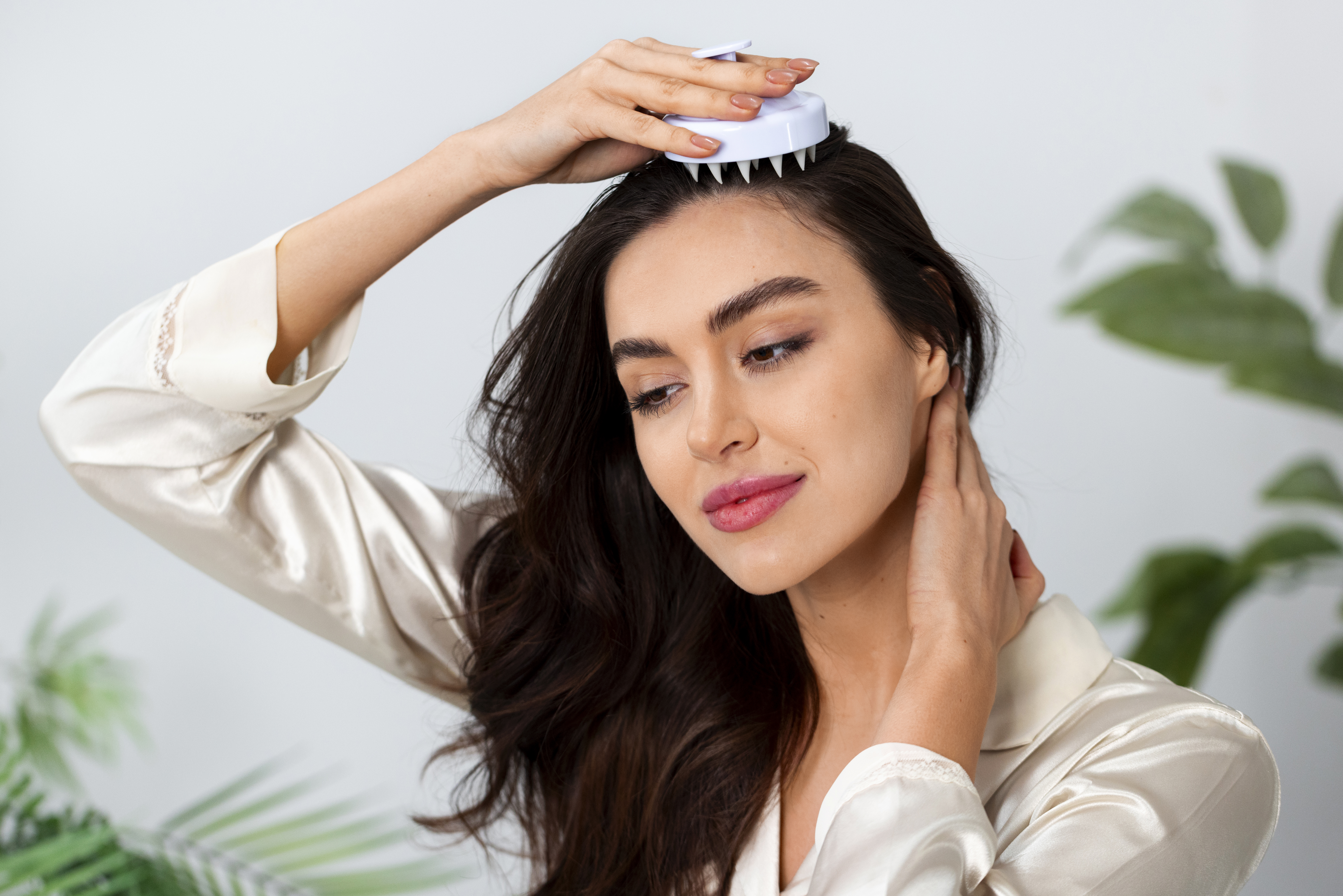 woman doing herself scalp massage